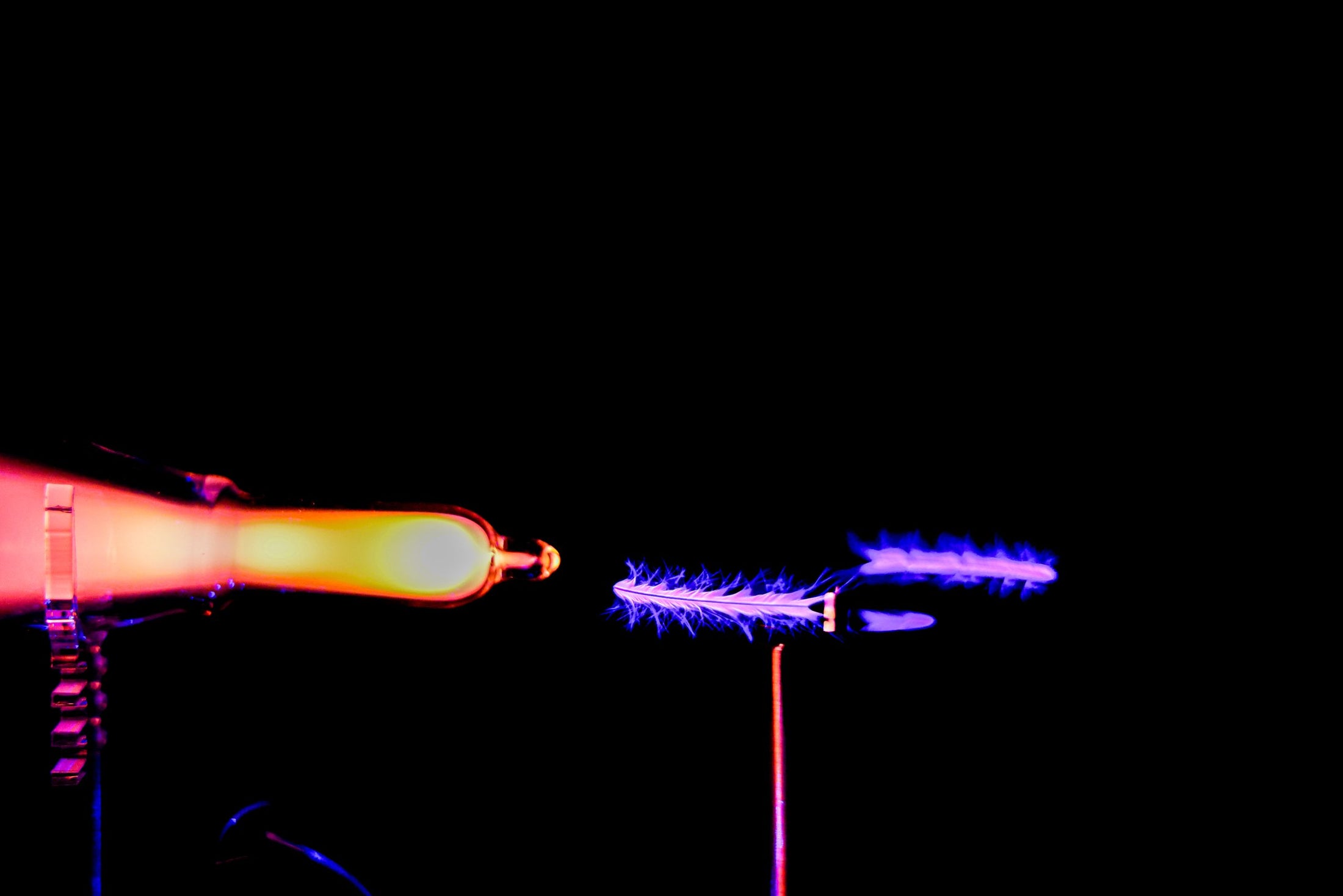 Quantaphi antenna spinning purple lighting up the plasma in a quantaphi tube