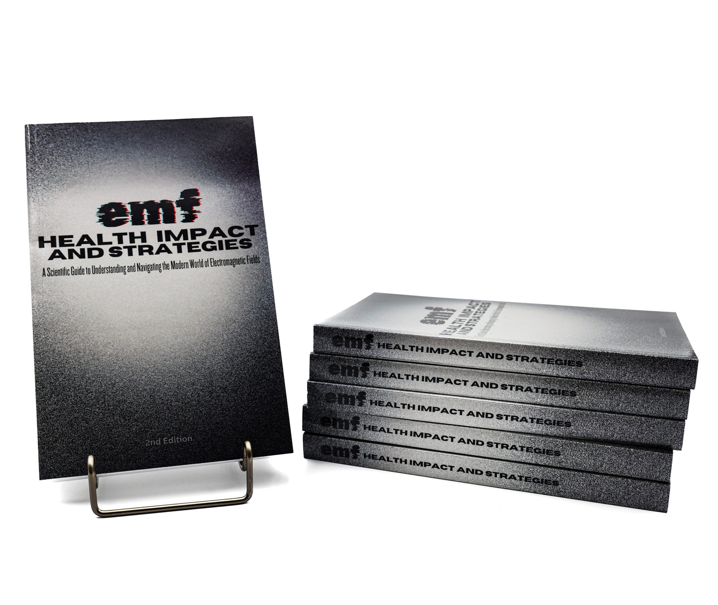 Stack of books titled 'emf Health Impact and Strategies' on a white background