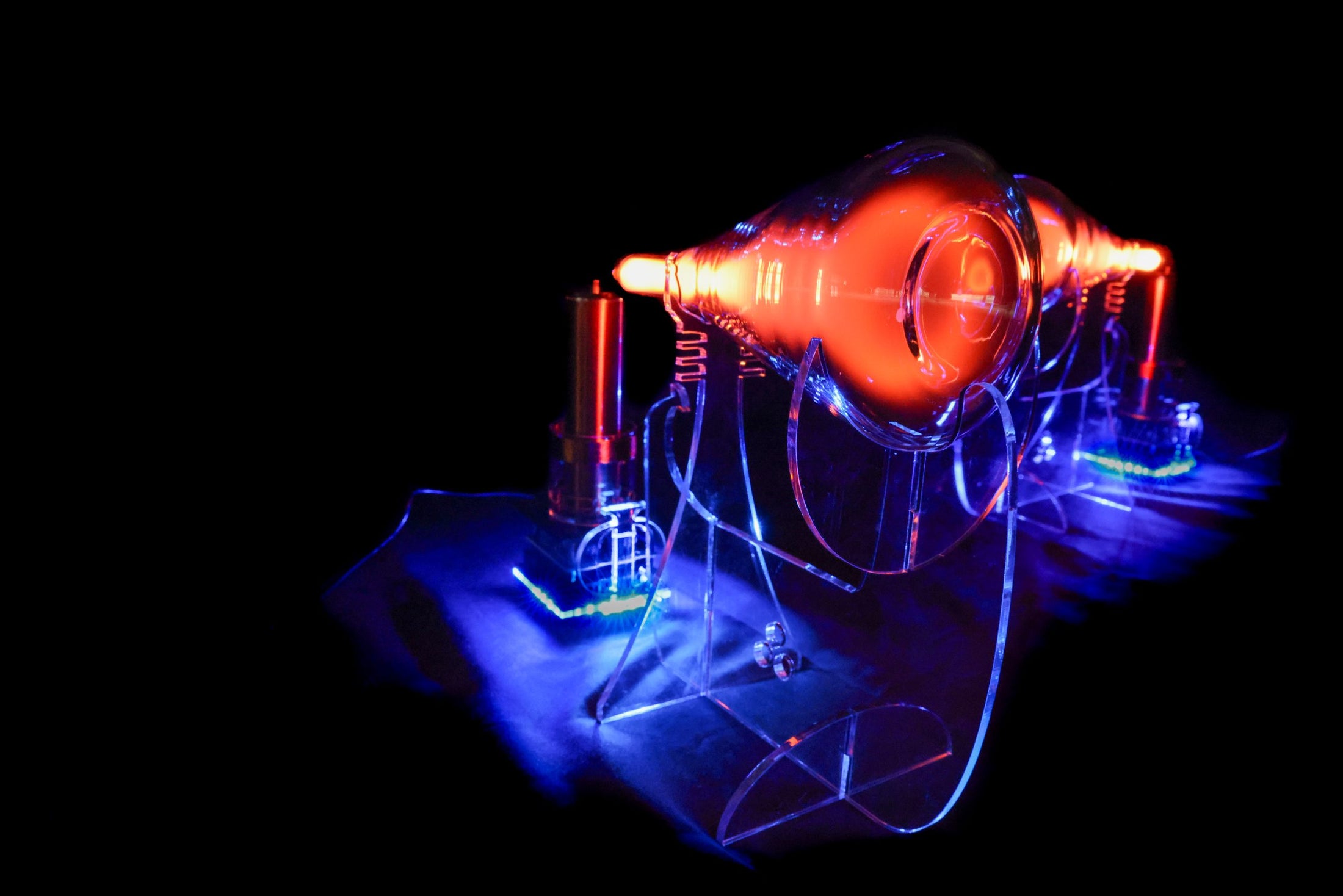 Quantaphi with glowing components on a black background