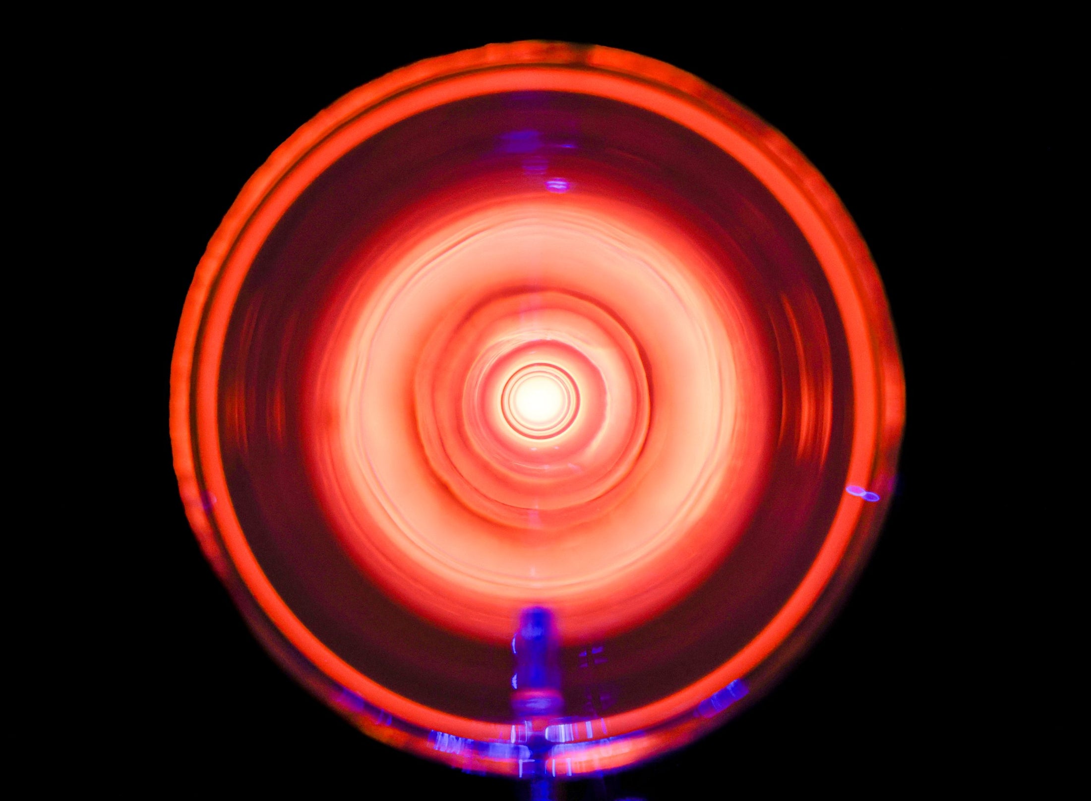 Quantaphi plasma effect on a black background