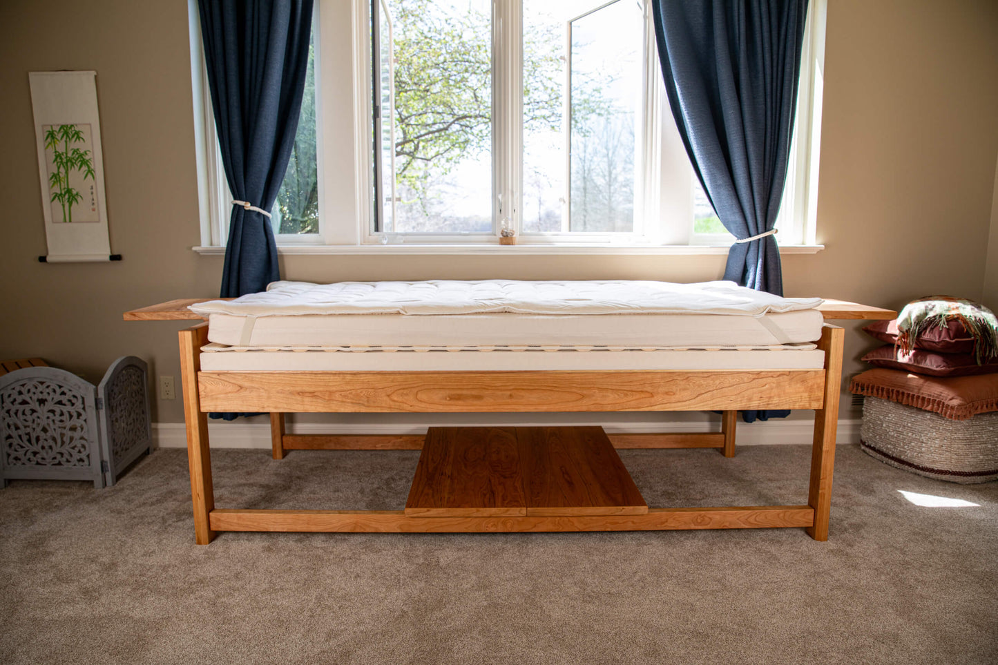 theraphi bed in front of a window